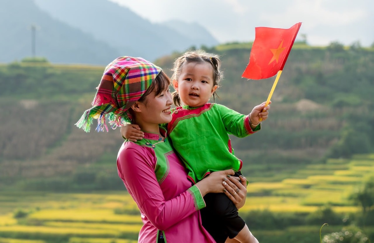 Vietnam family filming video outdoors