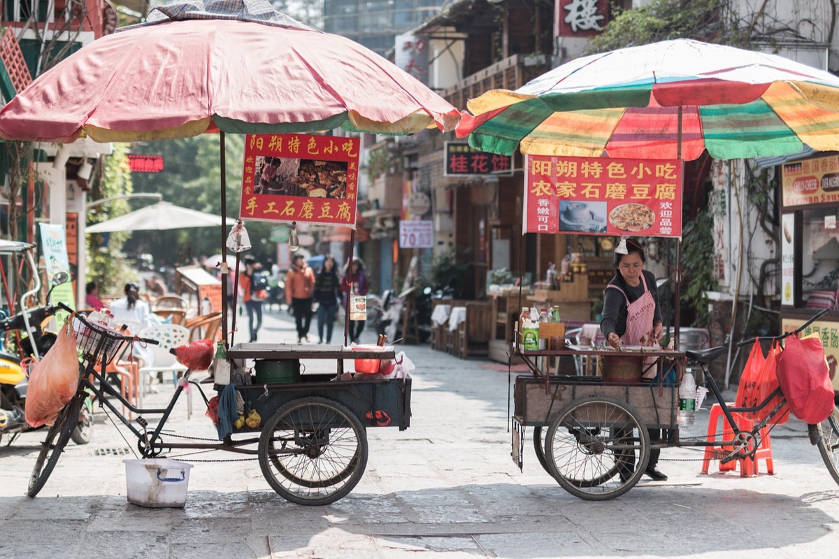 Vietnam street vendor with traditional hat